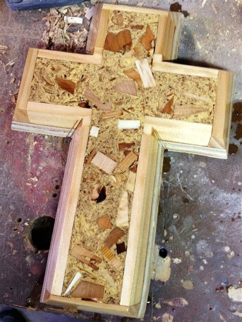 wood cross      scraps sawdust wood