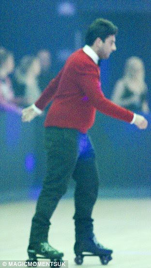 Professionals: Jess and James 'Arg' Argent look pretty good, staying upright, at the roller disco