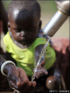 A child holds its hand under a water tap (Getty Images)