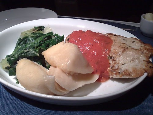 Spice-rubbed chicken with vodka sauce, potato pierogis, and Swiss chard