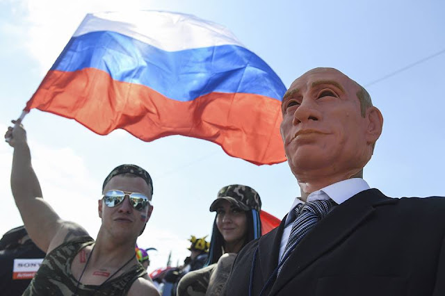 Costume festival brings bikini babes, superheroes, Putin to a Russian ski resort Costume festival brings bikini babes, superheroes, Putin to a Russian ski resort