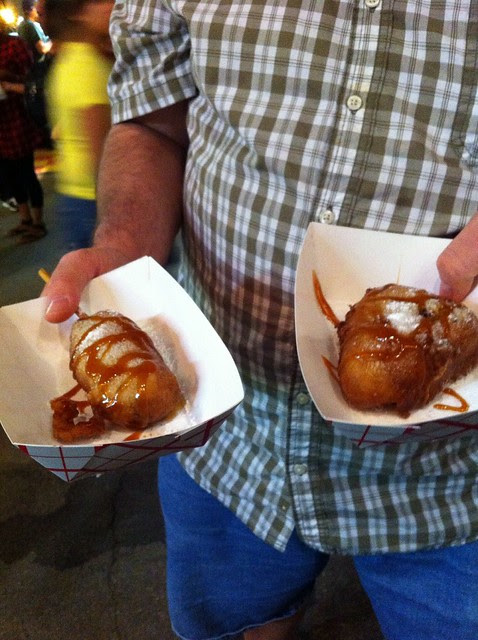 Deep fried Milky Way on a stick and deep fried Pecan Pie, both drizzed in caramel