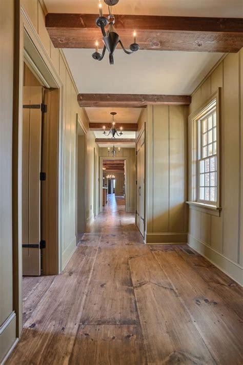 It is resistant to water and fungi. Wide Plank Wood Flooring | Interior Hallway | Classic