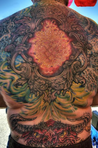 Full back tattoo on biker with demon