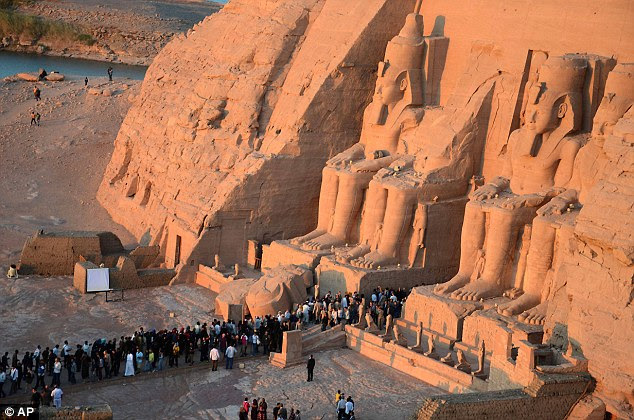 People visit the Great Temple of Ramses II to watch the sun illuminate its dark inner chamber