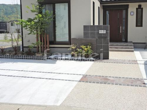 施工例玄関まわり アプローチ 門柱 表札 ポスト 照明 花壇 現場番号