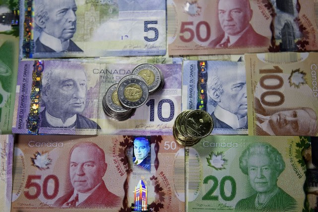 Alors que les politiciens, à Ottawa, n'arrivent pas à s'entendre sur ce que... (Photo Pawel Dwulit, Bloomberg)