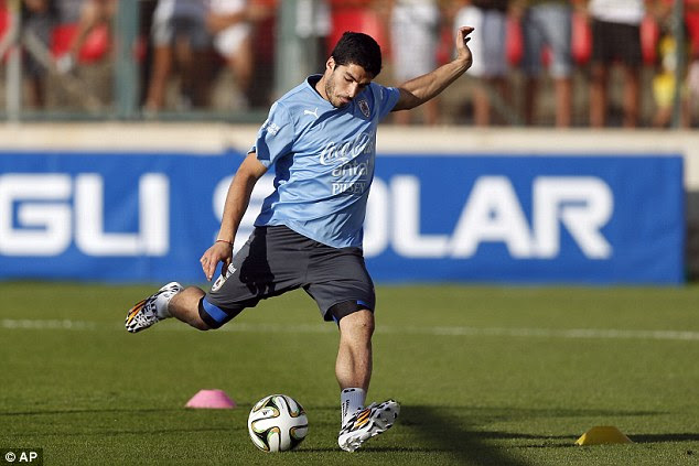 Fit and fresh: Suarez trained with the Uruguay team                  at Jacare Stadium on Tuesday