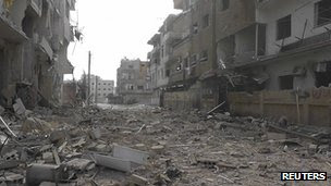 A view of buildings damaged by what activists said were missiles fired by a Syrian Air Force fighter jet loyal to Syria"s President Bashar al-Assad in Daria, near Damascus, 30 November 2012