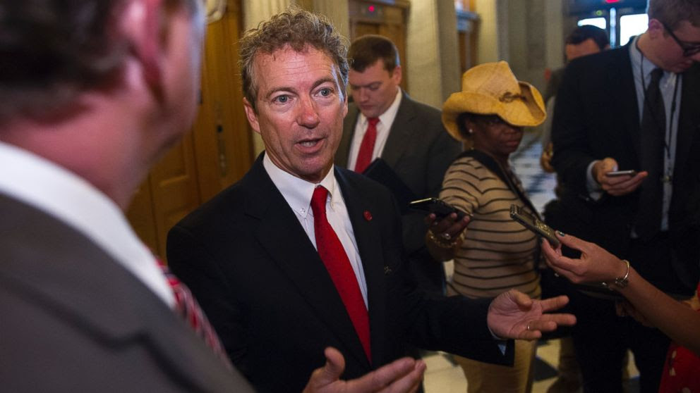 PHOTO: Sen. Rand Paul, R-Ky., talks with reporters outside of the Senate Chamber following his address to the Senate in Washington, Sunday, May 31, 2015.
