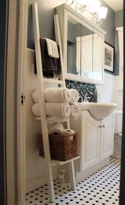 Looking for bathroom shelving that won't take up too much space? Try leaning a crisp white ladder against a wall and packing it full of towels and toiletries. Get the tutorial at Hammers & High Heels. 