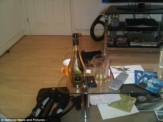 National News and Pictures
 
 A fraudster nicknamed 'Fizzy' for his love of champagne was today jailed for eight years for conning nearly £2 million out of vulnerable pensioners in a lottery scam to fund his luxury lifestyle, bubbly and fast cars. 
  
 Frank Onyeachonam, 38, deliberately preyed on the elderly in a lottery scam robbing some of them of their lifesavings. Detectives identified at least 14 victims but believe there may be another 61 and the total lost could be close to £30 million.
 
 Onyeachonam then spent the cash on Gucci, Louis Vuitton and Armani designer clothes, Rolex watches,  Porches and Maseratis and rented a luxury flat overlooking the Thames in London's Canary Wharf.
  
 A regular in members' clubs Onyeachonam would only drink his favourite Ace of Spades champagne costing between £300 and £500 a bottle.
 
 Such was his love of the fizzy stuff he also kept a fridge stocked full of it at his apartment and had so much cash he once spelled his name out in it and upl