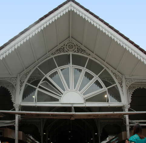 Victorian Architecture on Roof Peak Over Entrance