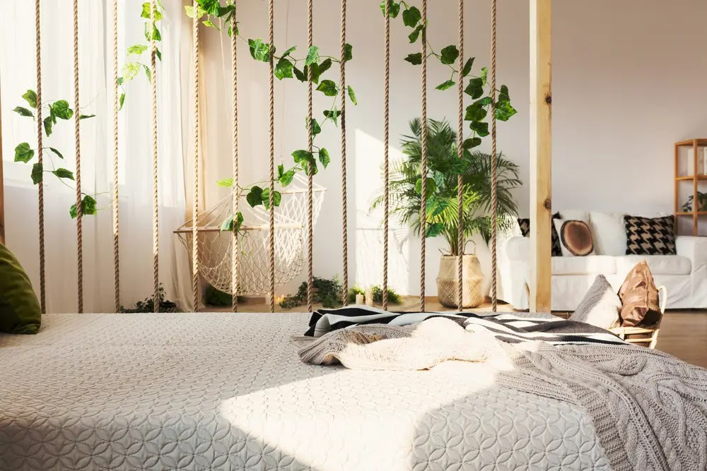 Vine and wooden room dividers and bedroom interior