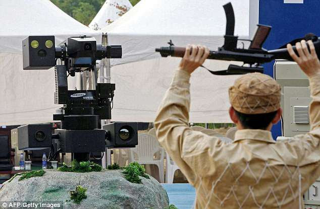 The sentry robot in action  in Cheonan, 92 kms south of Seoul.  The weapons-grade robot can detect, raise the alarm and provide suppressive fire.
