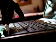 PHOTO: A person types on a laptop in this stock image.