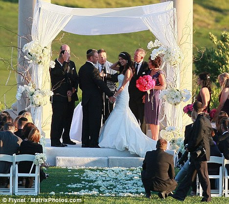 Fairytale setting: The guests sat outside,as teh wedding took  place under a gazebo