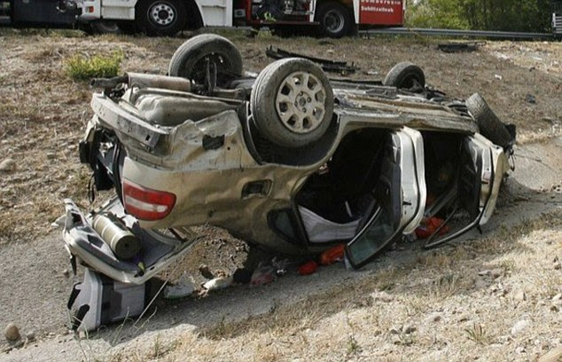The two girls were inside the Volvo with their mother and father when it overturned on a motorway in the north of Spain yesterday afternoon