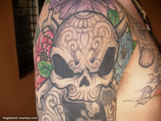 Skull tattoo first made in Florida and then re-done in Bangkok, Thailand.