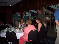 Rick Shevalier (standing at right)
