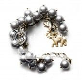 gold and pearl charm bracelet