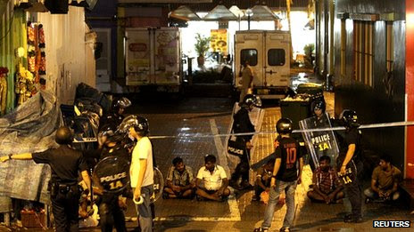 Arrested men in Little India. 8 Dec 2013