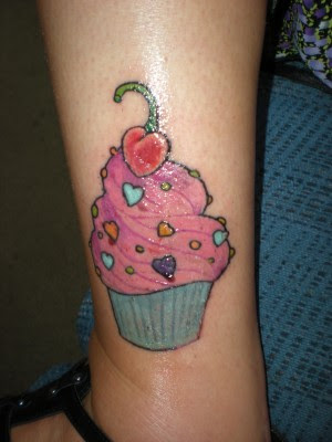 Peace, Love and Cupcakes, Kel. It was at South Shore Tattoo's in Massapequa 