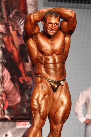 BUDAPEST - NOVEMBER 20: Kormany Mihaly participate in IFBB Champion of the Year 2011 bodybuilding championship Overall category on November 20, 2011 in Budapest, Hungary 