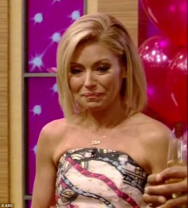 Kelly told the crowd: 'It is beyond my vocabulary to express to everybody here - family and friends, and the staff who feels like family and friends - what this means to me'