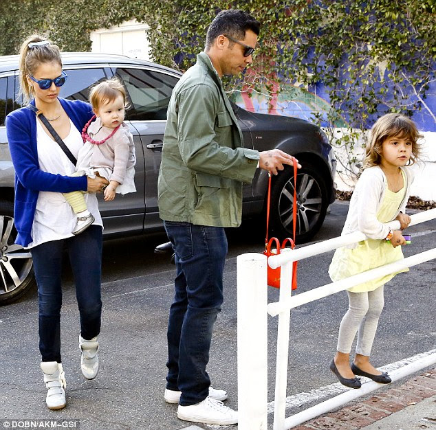 Busy mother: Jessica is married to actor Cash Warren and has two girls with the film producer