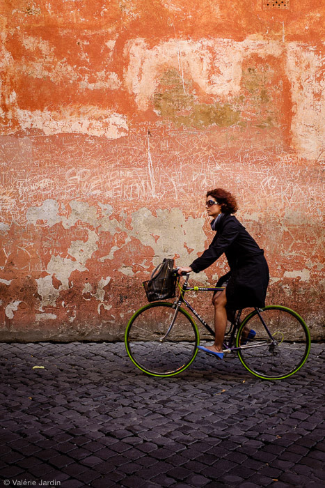 Finding a textured colorful background and waiting for the right subject to enter your frame makes for a strong color street photograph. The green tires and blue shoes completed the shot.