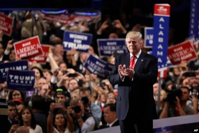 Republican presidential candidate Donald Trump takes the stage during the final day of the Republican National Convention in Cleveland, July 21, 2016.