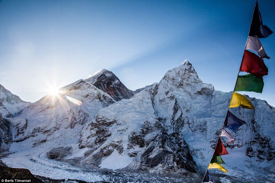 The sun peeks over the snow-capped mountains as Berta Tilmantaite attempts her three-week hike two years ago
