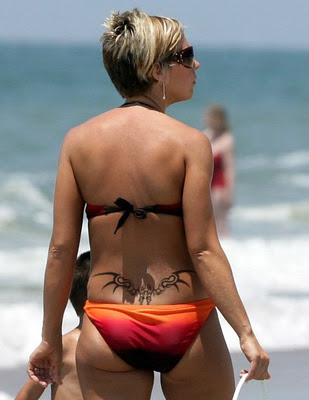  tattoo is actually a badass tiger. Not surprising. Kate Gosselin.wow.