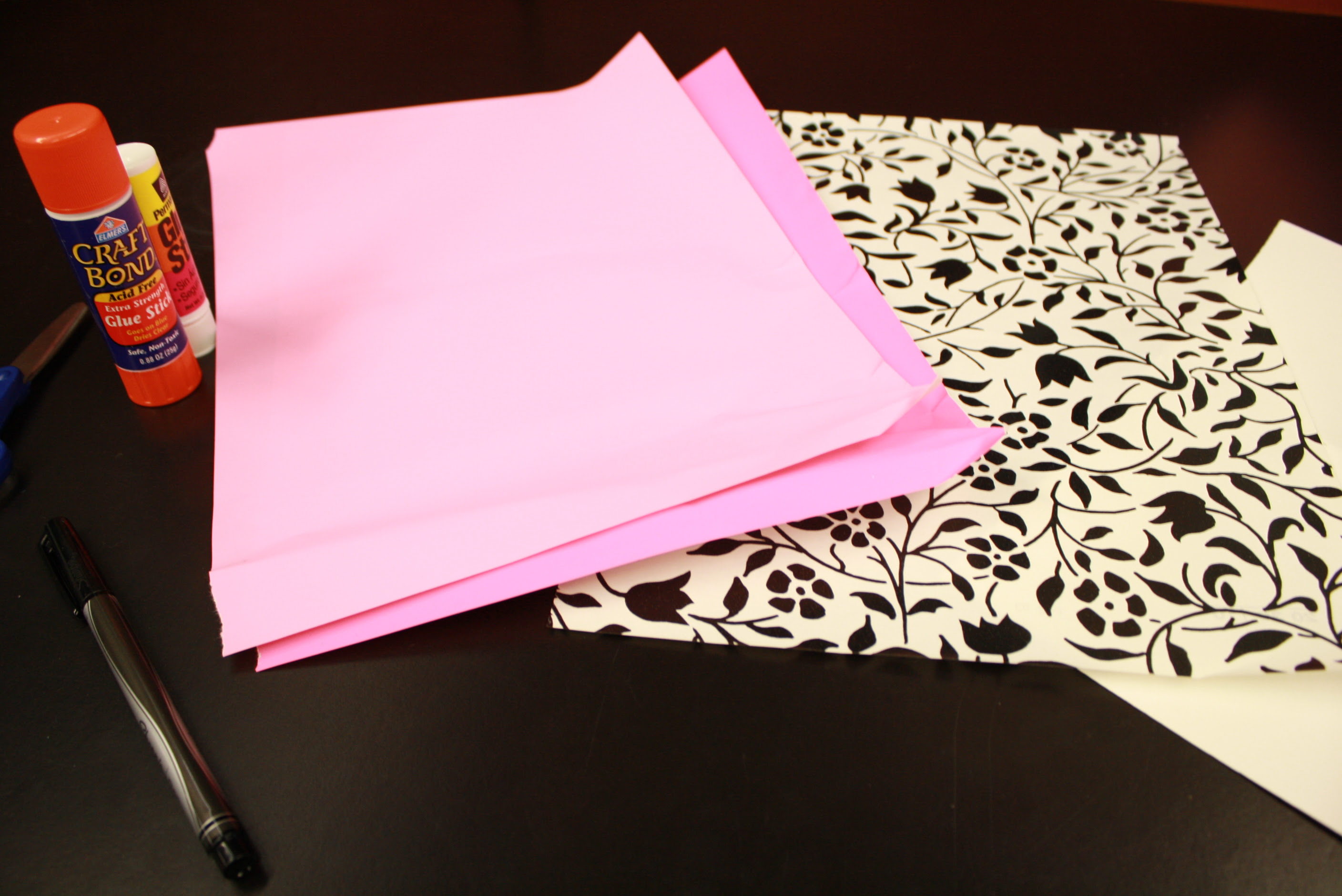 I used recycled wallpaper, wrapping paper and construction paper, glue,