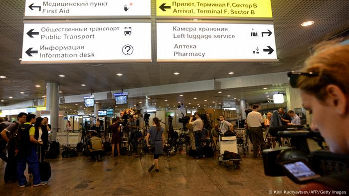 Journalists crowd inside the terminal F of Moscow's Sheremetyevo airport, on July 12, 2013, where US National Security Agency (NSA) fugitive leaker Edward Snowden reportedly remains without making any contact with the swarm of international reporters at the scene. Snowden has requested a meeting with leading Russian rights activists and lawyers at the airport in Moscow where he has been stuck in transit for the last three weeks, the campaigners invited said today. AFP PHOTO / KIRILL KUDRYAVTSEV (Photo credit should read KIRILL KUDRYAVTSEV/AFP/Getty Images)