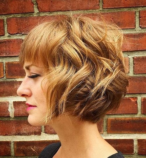 chin-length curly bob with bangs