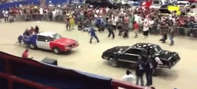 Two lowriders fight each other in the most ridiculous bouncing battle