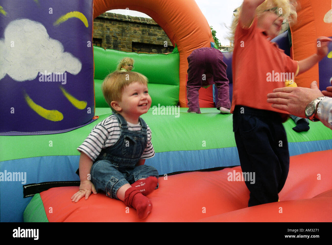Young Children And Toddlers Playing On Soft Play Area Stock Photo 