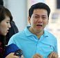 Pic shows: Pham Van Thoai is crying and begging shop staff after being duped for iPhone.  A man who was filmed on his knees crying and begging shop staff for a refund after buying a new iPhone 6 and being charged over 700 GBP in warranty fees has been helped by outraged crowd funders after the video went viral.  Factory worker Pham Van Thoai, 28, from Vietnam had saved up his 82 GBP per month salary to buy his girlfriend the new iPhone and had gone all the way to Singapore when he was hit by the scam.  After splashing out 460 GBP for the phone he was told by staff at the Mobile Air shop he would not be allowed to leave until he had paid an additional 730 GBP for a warranty package.  Devastated Pham then broke down and begged staff for a refund while they laughed at him.  He was eventually given 194 GBP back after the police intervened but had to leave without the phone.  Now, furious crowd-funders who saw the video have come to his aid, raising nearly 7,000 GBP.  The man behind the initiativ