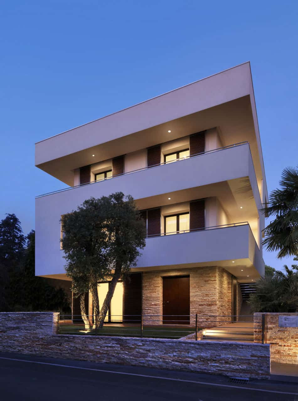 Italian maze house with geometric exterior, sliding ...