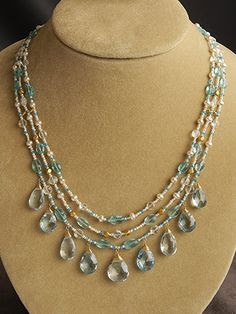 18kt gold, blue topaz, apatite, pearls