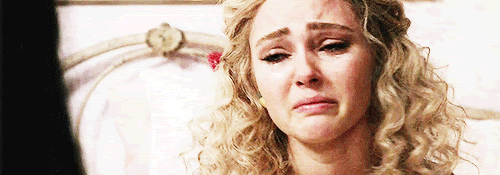 wiping away tears gif