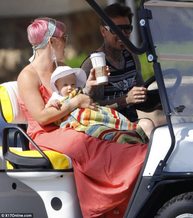 Having a ball: The couple shared several laughs during their fun day out