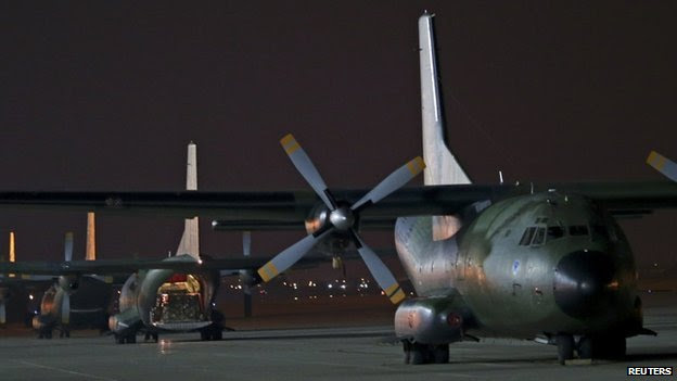 German Bundeswehr Transall C-160 plane carrying humanitarian aid stands on tarmac at Incirlik airbase near Adana, on 15 August 2014.