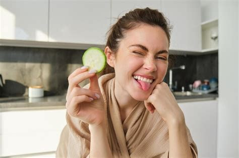 brunette girl posing in a kitchen