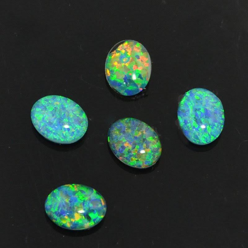s44114 Stone - 7 x 9 mm Oval Cabochon - Opal (Synthetic) (1)