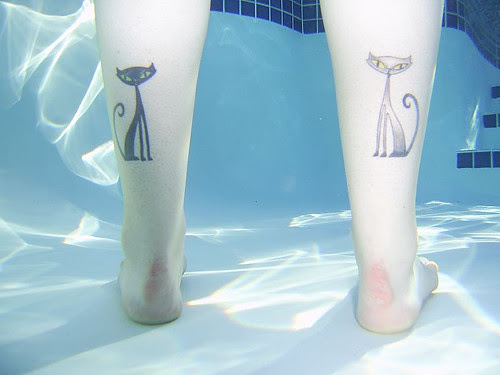 We share a tattoo! I got mine for my cats Jessie and Momo =)