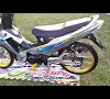Supra Modif : Modifikasi Motor Supra X 2002 - Arena Modifikasi : Modifikasi lain biasanya terlihat pada pengaplikasian stang terbuka atau stang baplang yang ditunjang handguard.