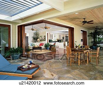 Stock Photo of Contemporary outdoor patio in coastal home ...